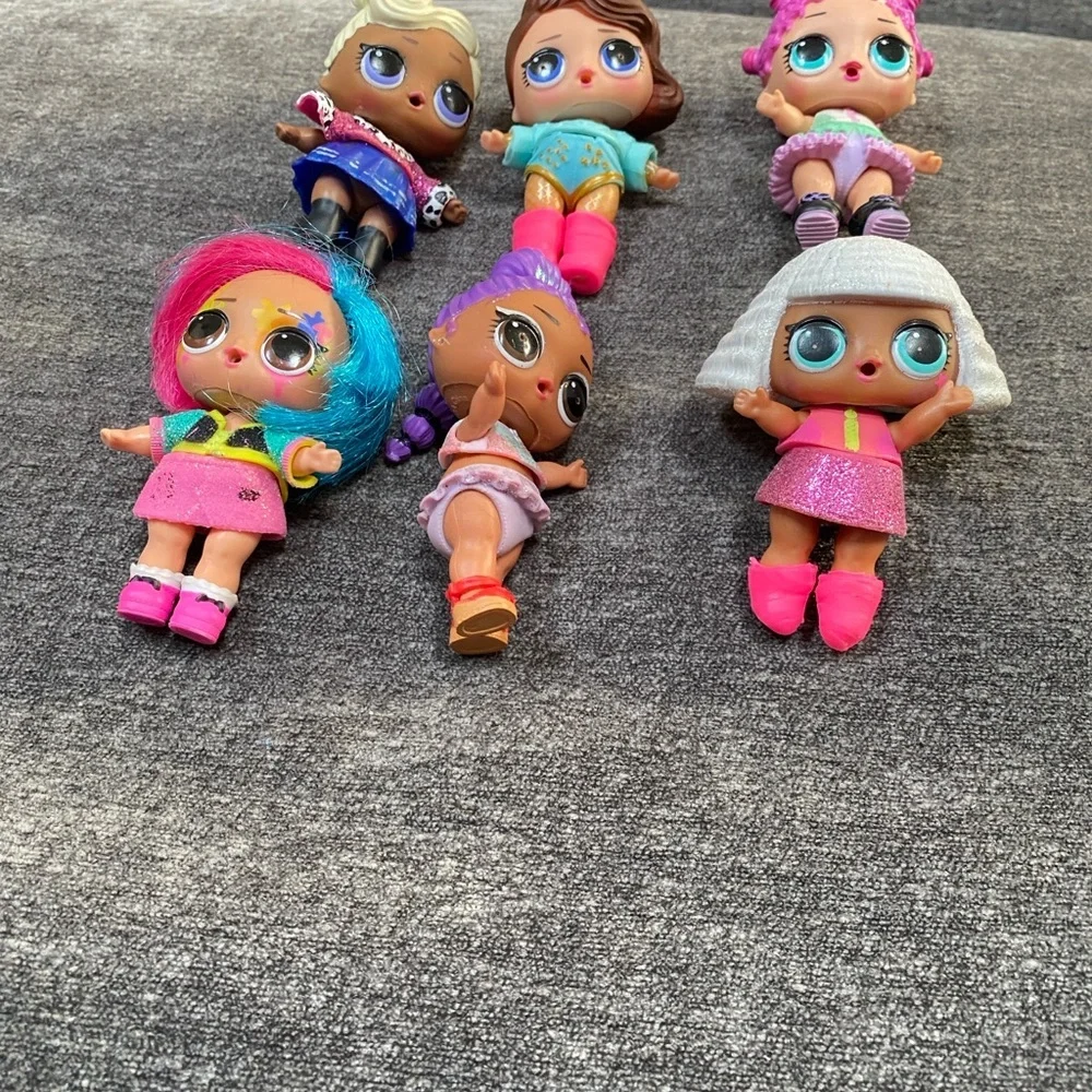 Six L.O.L Surprise dolls with 25 Piece  Accessories!